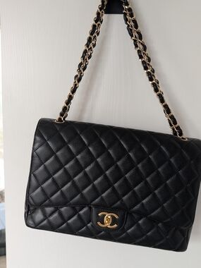Chanel Maxi Classic Flap Bag in Black Cavier with Gold Hardware